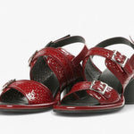Red heel with decorative straps block block heel and buckle closure pair