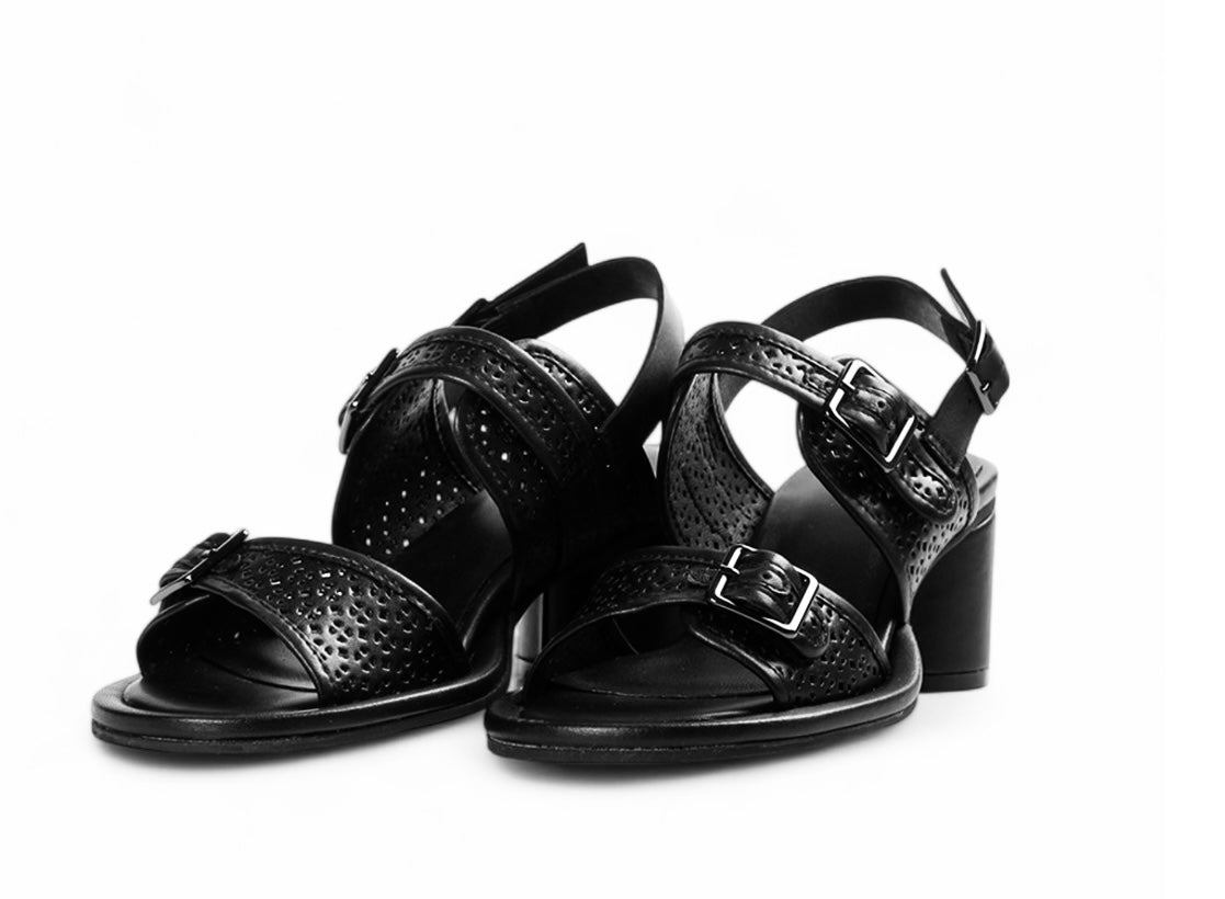 Black heel with decorative straps and buckle closure pair
