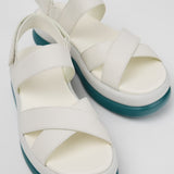 White platform sandal with a blue-green sole and multiple straps pair 