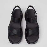 Black platform sandal with a thick sole and multiple straps pair from top