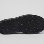 Black platform sandal with a thick sole and multiple straps bottom