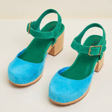 Green and blue suede shoe with golden buckle and wooden heel pair from front
