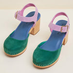 Green and blue suede clog shoe with pink strap with gold strap, and wooden sole pair from front top