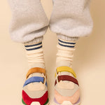 Multicolored velcro sneaker pair