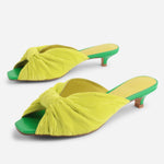 Yellow pleated kitten pen back sandal with a green heel pair 