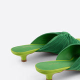 Green pleated kitten heel with open back pair close up heel