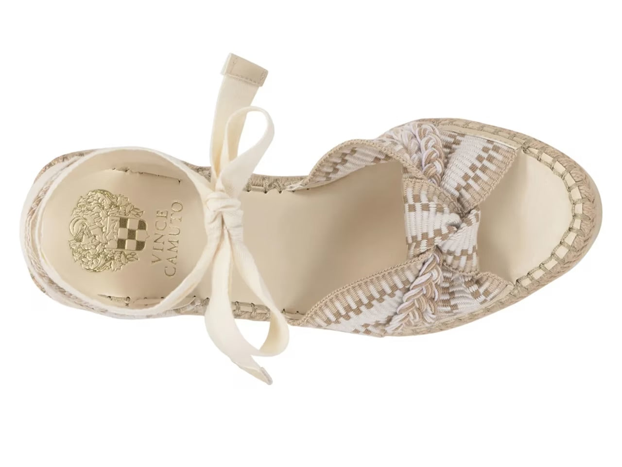 Beige sandal with woven design and bow on a white background