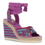 Colorful wedge sandal with a purple strap on a white background