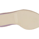 Beige shoe insole with purple border on a white background