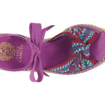 Purple sandal with a decorative strap on a white background