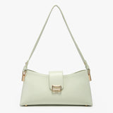 Light green handbag with a gold clasp close-up