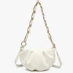 White handbag with a chain strap close-up