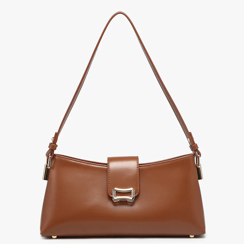 Brown handbag with a strap close-up
