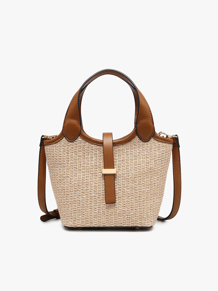 Woven handbag with brown leather accents close-up