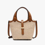 Woven handbag with brown leather accents close-up
