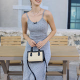 Black and beige handbag with straw texture model