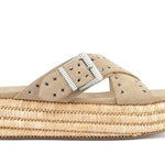 Beige sandal with woven sole close-up