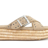 Beige sandal with woven sole close-up