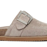 Light brown suede slipper with a strap close-up