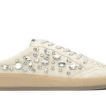 Beige sneaker with jewel embellishments close-up