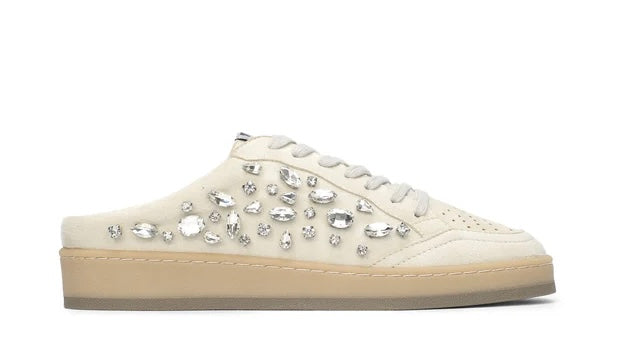 Beige sneaker with jewel embellishments close-up