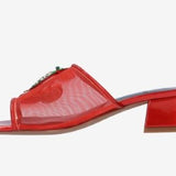 Red heel with decorative cherry elements inside