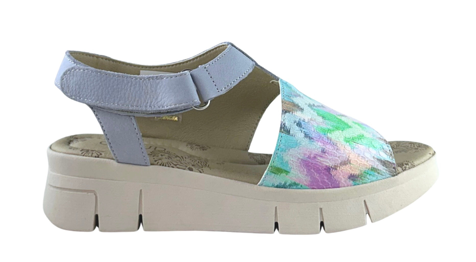 Colorful sandal with a white sole close-up