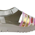 Silver sandal with colorful striped design close-up