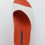 White sandal with a red sole top