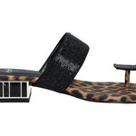 Black sandal with leopard print sole close-up