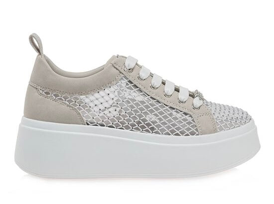 Gray sneaker with a big white sole close-up