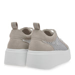 Gray sneaker with a big white sole heel