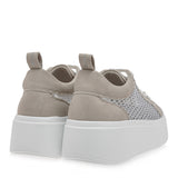 Gray sneaker with a big white sole heel