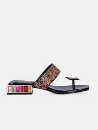 Black sandal with colorful gemstones and toe post close-up