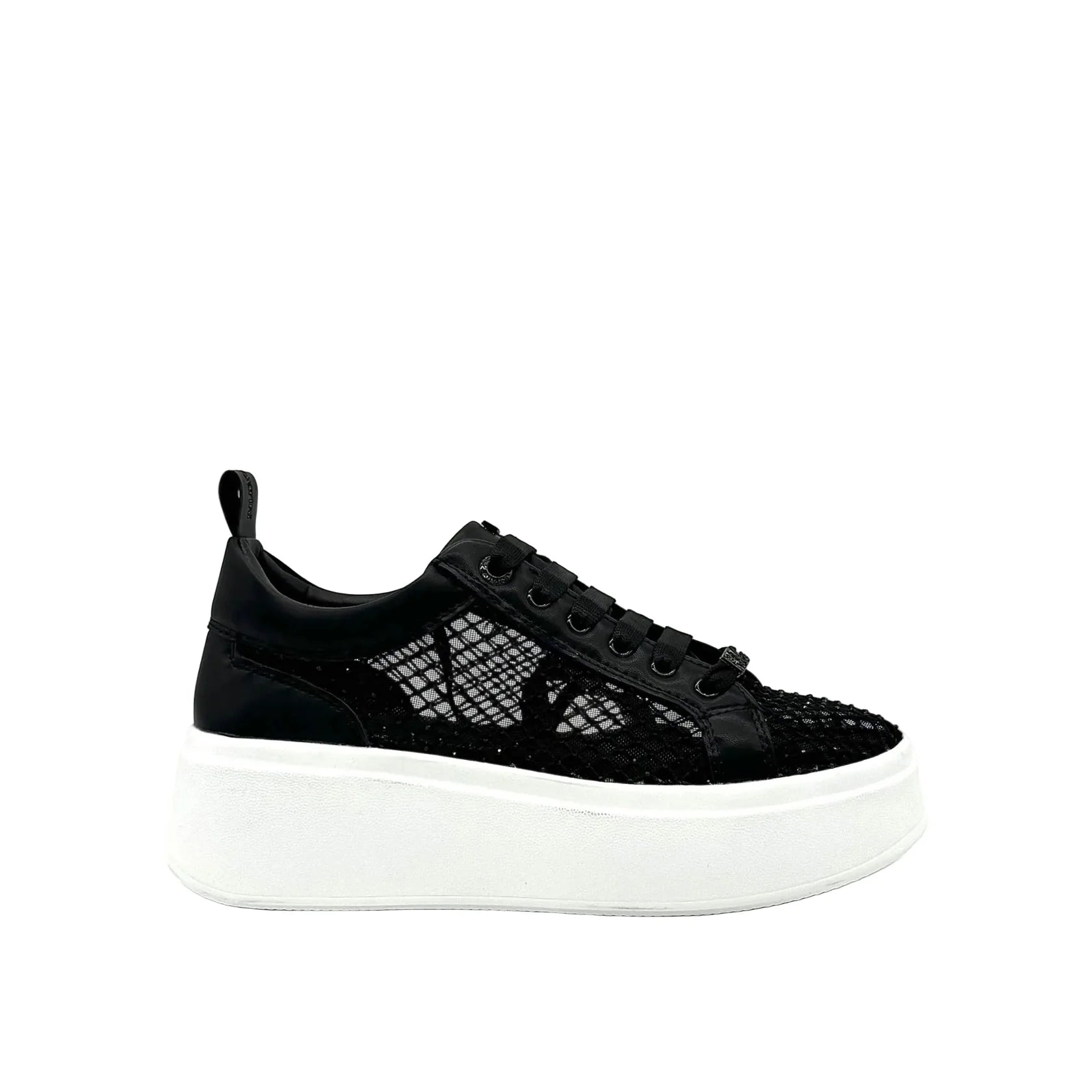 Black mesh sneaker with a white sole close-up