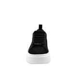 Black mesh sneaker with a white sole front