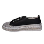 Black sneaker with gray sole side