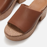 Brown platform sandal with woven sole top