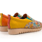 Yellow slip-on shoe with floral pattern pair heel