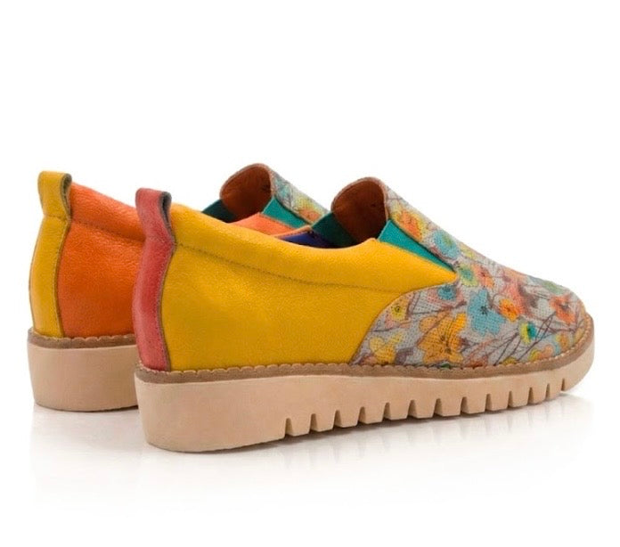 Yellow slip-on shoe with floral pattern pair heel