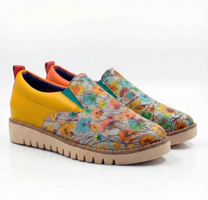 Yellow slip-on shoe with floral pattern pair side