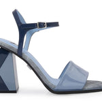 Blue high-heeled sandal with geometric sole design close-up