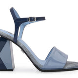 Blue high-heeled sandal with geometric sole design close-up