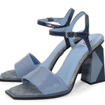 Blue high-heeled sandal with geometric sole design pair
