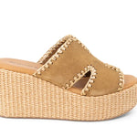 Beige wedge sandal with woven sole closer-up