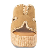 Beige wedge sandal with woven sole front