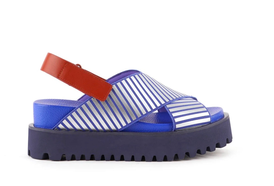 Blue and white striped sandal with a brown strap