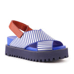 Blue and white striped sandal with a brown strap on a white background