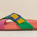 Colorful sandal with a peach/blue buckle 
