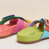 Colorful sandal with a peach/blue buckle heel